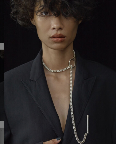 Modern silver chain that continues to become a lapel pin
